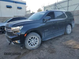 2023 Chevrolet Tahoe LS z VIN 1GNSKMKD4PR184687, wystawiony jako Copart lot #52014155 z przebiegiem 27 363 mil mil oraz Szkoda całkowita • Salvage title. Historia ofert i sprzedaży dostępna na DreamBid. Obrazek 1.