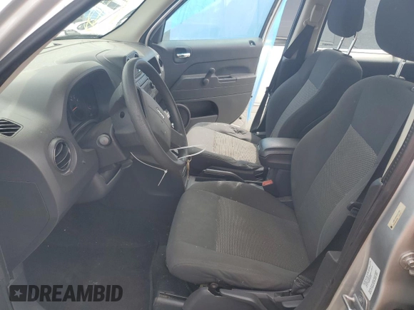 2010 Jeep Patriot Sport with VIN 1J4NF2GB4AD521492, listed as a Copart auction lot 48303095 with 0 mi miles and Salvage Title. Bid and sale history available at carsss.com. Image 7.