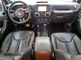 2014 Jeep Wrangler Unlimited Rubicon с VIN 1C4HJWFG3EL322449, выставлен на аукционе Copart как лот 57187665 с пробегом 122 469 миль миль и Списание • Salvage title. История ставок и продаж доступна на DreamBid. Изображение 8.