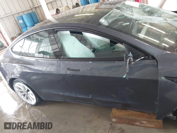 2023 Tesla Model 3 z VIN 5YJ3E1EA2PF591661, wystawiony jako IAAI lot #42014086 z przebiegiem 13 945 mil mil oraz . Historia ofert i sprzedaży dostępna na DreamBid. Obrazek 13.