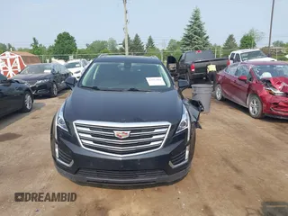 2018 Cadillac XT5 Luxury AWD with VIN 1GYKNDRSXJZ247863, listed as a IAAI auction lot 42392404 with 96,629 mi miles and . Bid and sale history available at DreamBid. Image 12.