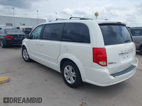 2011 Dodge Grand Caravan Crew with VIN 2D4RN5DGXBR786592, listed as a IAAI auction lot 42114198 with 243,423 mi miles and . Bid and sale history available at DreamBid. Image 3.