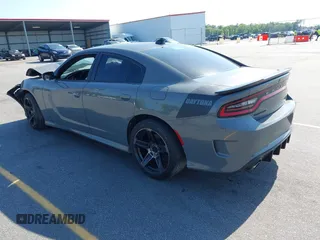 2017 Dodge Charger R/T with VIN 2C3CDXCT6HH595433, listed as a IAAI auction lot 42034429 with 123,512 mi miles and . Bid and sale history available at DreamBid. Image 3.