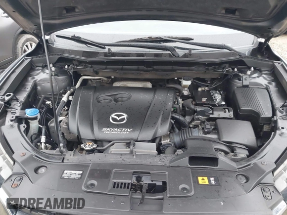 2016 Mazda CX-5 Sport with VIN JM3KE4BY5G0885754, listed as a IAAI auction lot 41103575 with 136,263 mi miles and . Bid and sale history available at carsss.com. Image 10.