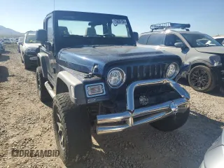 2005 Jeep Wrangler SE with VIN 1J4FA29S65P330905, listed as a Copart auction lot 71633134 with 77,598 mi miles and Salvage Title. Bid and sale history available at carsss.com. Image 5.