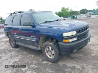 2003 Chevrolet Tahoe LS z VIN 1GNEK13T73J244424, wystawiony jako IAAI lot #42284777 z przebiegiem 233 833 mil mil oraz . Historia ofert i sprzedaży dostępna na DreamBid. Obrazek 1.