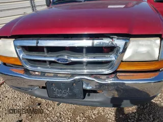 2000 Ford Ranger XL z VIN 1FTYR14VXYPA69799, wystawiony jako IAAI lot #41832287 z przebiegiem 182 397 mil mil oraz . Historia ofert i sprzedaży dostępna na DreamBid. Obrazek 6.