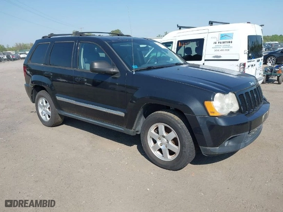 2010 Jeep Grand Cherokee Laredo with VIN 1J4PR4GK5AC120373, listed as a IAAI auction lot 42071835 with 101,949 mi miles. Bid and sale history available at carsss.com. Image 1.
