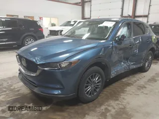 2019 Mazda CX-5 Touring with VIN JM3KFBCM1K0584369, listed as a IAAI auction lot 41657765 with 77,934 mi miles. Bid and sale history available at carsss.com. Image 17.