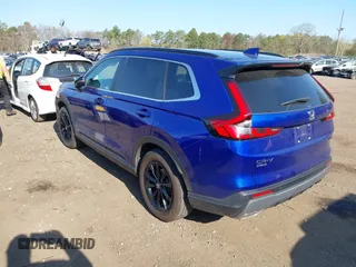 2023 Honda CR-V Sport Touring with VIN 5J6RS6H96PL001826, listed as a IAAI auction lot 42098381 with 13,813 mi miles and . Bid and sale history available at DreamBid. Image 3.