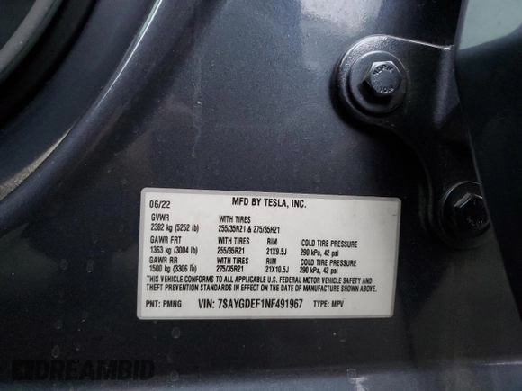 2022 Tesla Model Y Performance with VIN 7SAYGDEF1NF491967, listed as a Copart auction lot 51119515 with 50,520 mi miles and Salvage title. Bid and sale history available at DreamBid. Image 14.