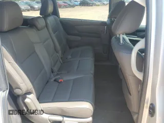 2014 Honda Odyssey EX-L z VIN 5FNRL5H66EB045019, wystawiony jako Copart lot #62899125 z przebiegiem 179 298 mil mil oraz Szkoda całkowita • Salvage title. Historia ofert i sprzedaży dostępna na DreamBid. Obrazek 11.