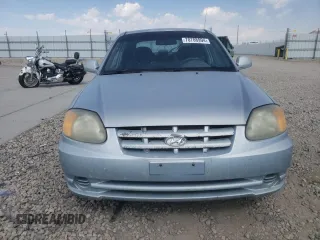 2005 Hyundai Accent GLS with VIN KMHCG35C55U341192, listed as a Copart auction lot 70708994 with 174,872 mi miles and Salvage Title. Bid and sale history available at carsss.com. Image 5.