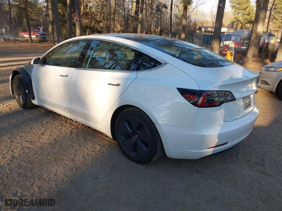 2020 Tesla Model 3 Standard Range Plus with VIN 5YJ3E1EA6LF709009, listed as a IAAI auction lot 40986966 with 116,495 mi miles. Bid and sale history available at carsss.com. Image 3.