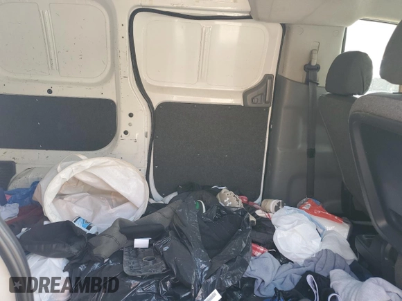 2015 Nissan NV200 S z VIN 3N6CM0KN8FK696261, wystawiony jako Copart lot #50001695 z przebiegiem Nie podano mil oraz Szkoda całkowita • Salvage title. Historia ofert i sprzedaży dostępna na DreamBid. Obrazek 11.