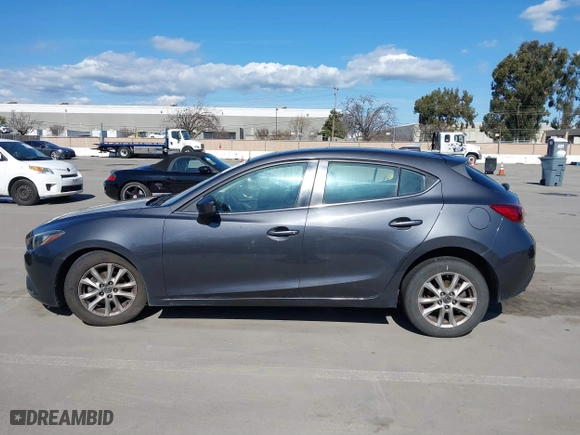 2016 Mazda Mazda3 i Grand Touring with VIN JM1BM1N74G1333699, listed as a IAAI auction lot 41836178 with 194,946 mi miles. Bid and sale history available at carsss.com. Image 14.