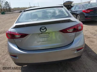 2016 Mazda Mazda3 i Sport with VIN JM1BM1T71G1335980, listed as a IAAI auction lot 42003186 with 131,015 mi miles. Bid and sale history available at carsss.com. Image 16.