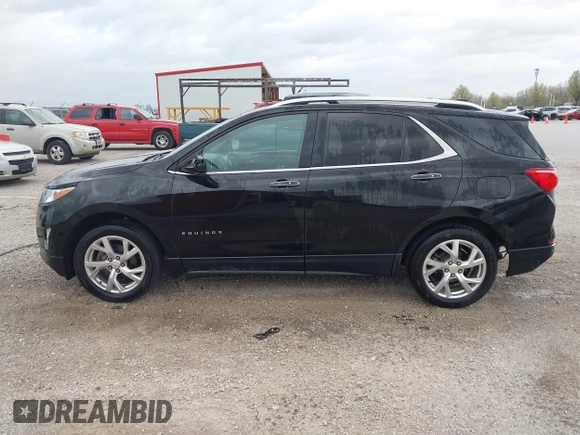 2018 Chevrolet Equinox Premier with VIN 2GNAXVEV7J6275379, listed as a IAAI auction lot 41949962 with 149,329 mi miles and . Bid and sale history available at DreamBid. Image 14.