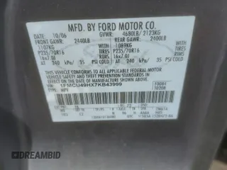 2007 Ford Escape Hybrid with VIN 1FMCU49HX7KB43999, listed as a Copart auction lot 53320974 with 203,002 mi miles and Non Repairable. Bid and sale history available at carsss.com. Image 15.