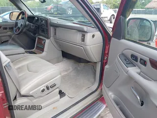 2003 Cadillac Escalade z VIN 1GYEK63N53R183593, wystawiony jako IAAI lot #42438258 z przebiegiem 74 561 mil mil oraz . Historia ofert i sprzedaży dostępna na DreamBid. Obrazek 5.