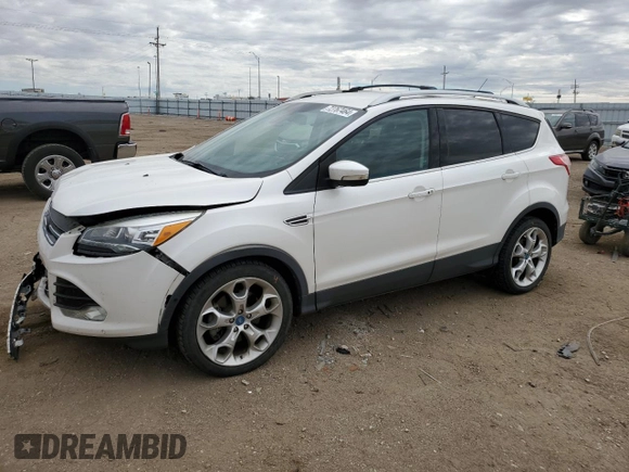 2013 Ford Escape Titanium with VIN 1FMCU0J90DUB90746, listed as a Copart auction lot 72767464 with 67,388 mi miles and Salvage Title. Bid and sale history available at carsss.com. Image 1.