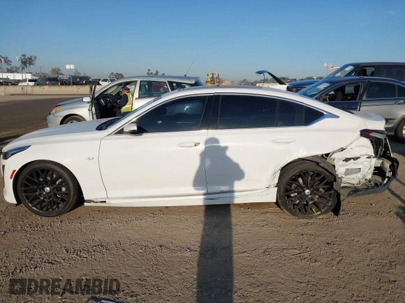 2020 Cadillac CT5 Luxury z VIN 1G6DW5RK9L0128732, wystawiony jako IAAI lot #41958505 z przebiegiem 49 919 mil mil oraz . Historia ofert i sprzedaży dostępna na DreamBid. Obrazek 14.