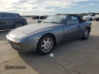 1991 Porsche 944 z VIN WP0ZZZ94ZLN431804, wystawiony jako Copart lot #73870554 z przebiegiem 131 475 mil mil oraz Szkoda całkowita • Salvage title. Historia ofert i sprzedaży dostępna na DreamBid. Obrazek 1.