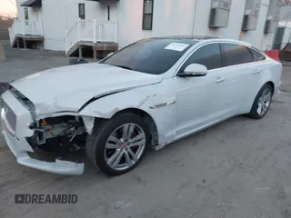 2017 Jaguar XJ with VIN SAJWJ2GD5H8W08395, listed as a IAAI auction lot 41014883 with 80,584 mi miles. Bid and sale history available at carsss.com. Image 17.