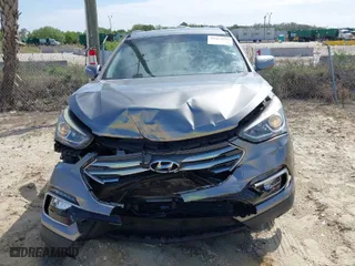 2018 Hyundai Santa Fe Sport 2.4L with VIN 5XYZU3LB8JG563903, listed as a IAAI auction lot 41814986 with 56,287 mi miles. Bid and sale history available at carsss.com. Image 6.