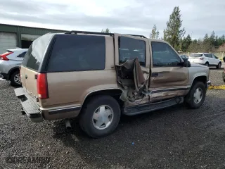 1996 Chevrolet Tahoe with VIN 1GNEK13R5TJ420715, listed as a Copart auction lot 48997145 with 303,588 mi miles and Salvage Title. Bid and sale history available at carsss.com. Image 3.