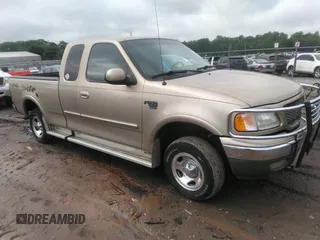 2000 Ford F-150 XL with VIN 1FTRX18L2YNA47066, listed as a IAAI auction lot 42127285 with 1 mi miles. Bid and sale history available at carsss.com. Image 1.