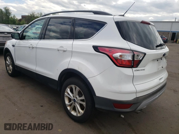 2018 Ford Escape SE z VIN 1FMCU9GDXJUA71940, wystawiony jako Copart lot #55891775 z przebiegiem 117 298 mil mil oraz Tytuł czysty. Historia ofert i sprzedaży dostępna na DreamBid. Obrazek 2.