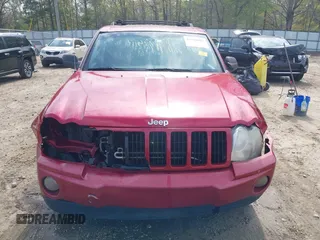 2005 Jeep Grand Cherokee Laredo with VIN 1J4HS48N95C711992, listed as a IAAI auction lot 41944696 with 209,299 mi miles and . Bid and sale history available at DreamBid. Image 12.