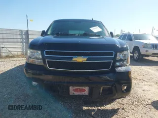 2014 Chevrolet Suburban LT with VIN 1GNSCJE00ER198703, listed as a IAAI auction lot 41952805 with 228,579 mi miles and . Bid and sale history available at DreamBid. Image 12.