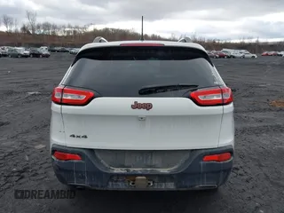 2016 Jeep Cherokee Latitude with VIN 1C4PJMCB8GW282752, listed as a IAAI auction lot 41475436 with 94,257 mi miles. Bid and sale history available at carsss.com. Image 16.