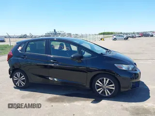 2016 Honda Fit EX with VIN JHMGK5H74GX042436, listed as a IAAI auction lot 42227520 with 106,777 mi miles and . Bid and sale history available at DreamBid. Image 14.