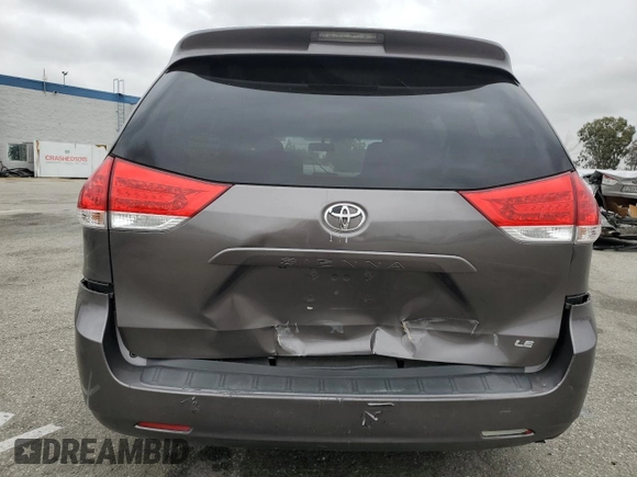 2012 Toyota Sienna LE AAS с VIN 5TDKK3DC8CS241590, выставлен на аукционе Copart как лот 53308815 с пробегом 141 292 миль миль и Списание • Salvage title. История ставок и продаж доступна на DreamBid. Изображение 6.