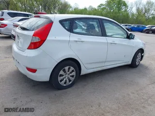 2017 Hyundai Accent SE with VIN KMHCT5AE4HU313404, listed as a IAAI auction lot 42035860 with 123,951 mi miles. Bid and sale history available at carsss.com. Image 4.