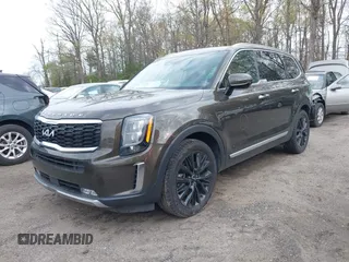 2022 Kia Telluride SX with VIN 5XYP54HC4NG271392, listed as a IAAI auction lot 42019407 with 50,971 mi miles and . Bid and sale history available at DreamBid. Image 2.