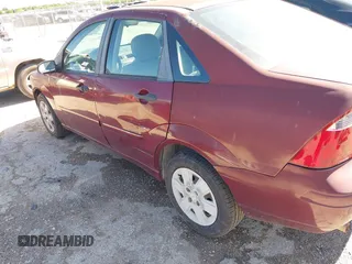 2007 Ford Focus S with VIN 1FAFP34N77W297780, listed as a IAAI auction lot 42074788 with 153,441 mi miles and . Bid and sale history available at carsss.com. Image 12.