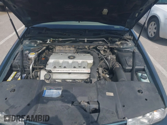1993 Cadillac Seville STS z VIN 1G6KY5298PU821640, wystawiony jako IAAI lot #42269233 z przebiegiem 126 662 mil mil oraz . Historia ofert i sprzedaży dostępna na DreamBid. Obrazek 10.
