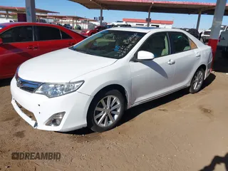 2014 Toyota Camry SE with VIN 4T1BK1FK2EU543220, listed as a IAAI auction lot 41416785 with 198,011 mi miles. Bid and sale history available at carsss.com. Image 2.