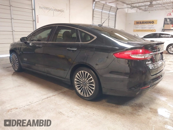 2017 Ford Fusion Titanium with VIN 3FA6P0SUXHR208653, listed as a IAAI auction lot 41312067 with 62,601 mi miles and . Bid and sale history available at DreamBid. Image 3.