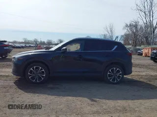 2023 Mazda CX-5 S Premium with VIN JM3KFBDM7P0201038, listed as a IAAI auction lot 41772989 with 26,227 mi miles and . Bid and sale history available at DreamBid. Image 14.