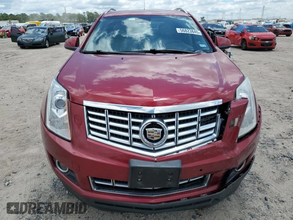 2014 Cadillac SRX Premium Collection z VIN 3GYFNDE33ES571840, wystawiony jako Copart lot #56823845 z przebiegiem 139 686 mil mil oraz Szkoda całkowita • Salvage title. Historia ofert i sprzedaży dostępna na DreamBid. Obrazek 5.