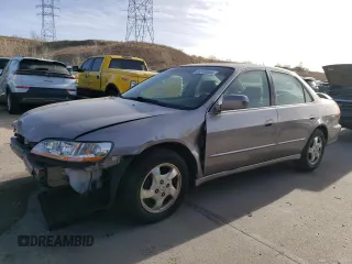 2000 Honda Accord EX z VIN JHMCG5655YC028510, wystawiony jako Copart lot #84955064 z przebiegiem 161 545 mil mil oraz Szkoda całkowita • Salvage title. Historia ofert i sprzedaży dostępna na DreamBid. Obrazek 1.