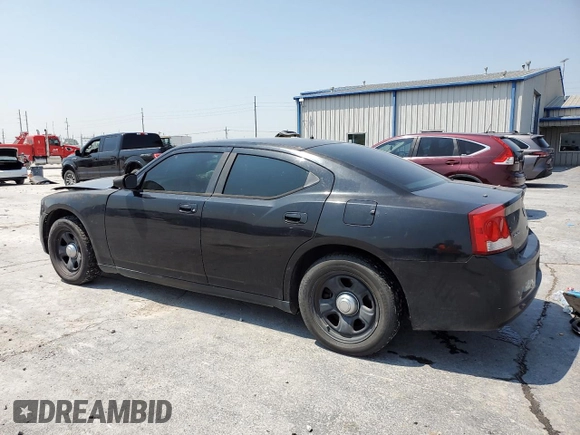 2009 Dodge Charger Police with VIN 2B3KA43T49H536981, listed as a Copart auction lot 54721694 with 160,508 mi miles and Salvage Title. Bid and sale history available at carsss.com. Image 2.