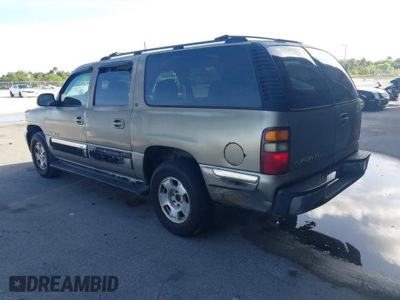 2001 GMC Yukon XL SLE with VIN 1GKFK16T11J219092, listed as a IAAI auction lot 41688439 with 194,128 mi miles. Bid and sale history available at carsss.com. Image 3.