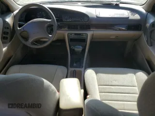 1996 Nissan Altima XE z VIN 1N4BU31D5TC104895, wystawiony jako Copart lot #77043684 z przebiegiem 133 113 mil mil oraz Szkoda całkowita • Salvage title. Historia ofert i sprzedaży dostępna na DreamBid. Obrazek 8.