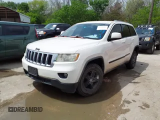 2012 Jeep Grand Cherokee Laredo with VIN 1C4RJFAG8CC124877, listed as a IAAI auction lot 41940603 with 254,356 mi miles. Bid and sale history available at carsss.com. Image 17.